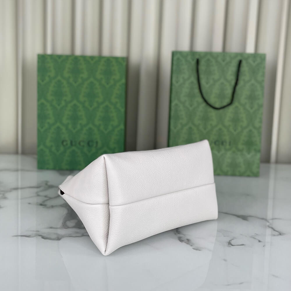G*u*i softbit medium top handle bag