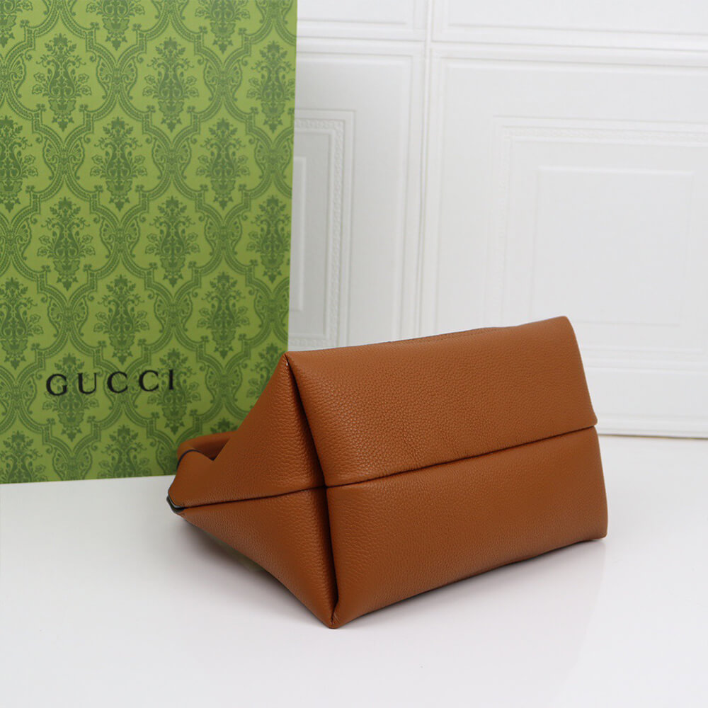 G*u*i softbit medium top handle bag