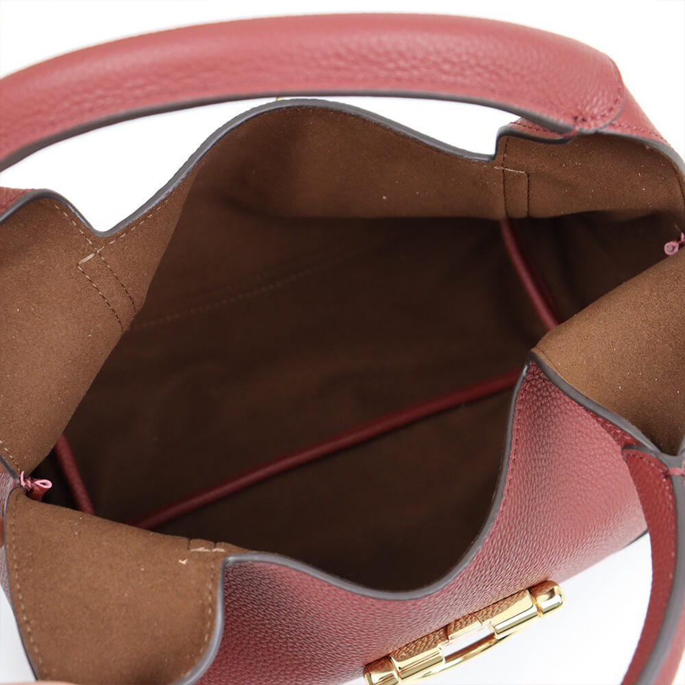 G*u*i softbit medium top handle bag